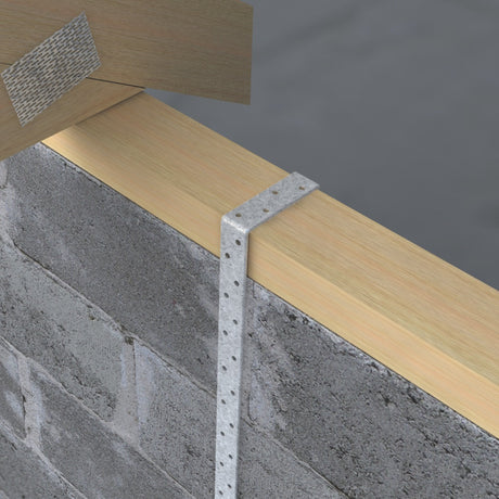 Wooden beam with metal bracket against a concrete wall